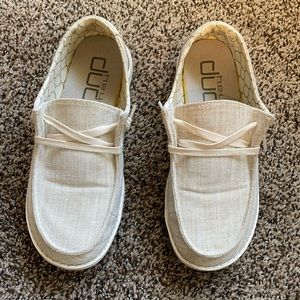 Women’s Hey Dude. Wendy Sparkling gold.